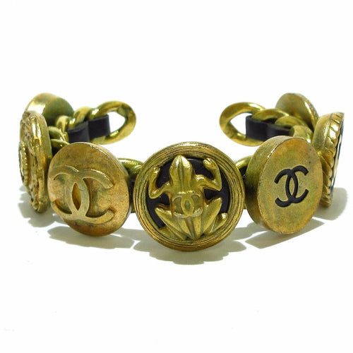 Vintage Chanel cuff bracelet bangle 7 icon charm black round - aptiques by Authentic PreOwned